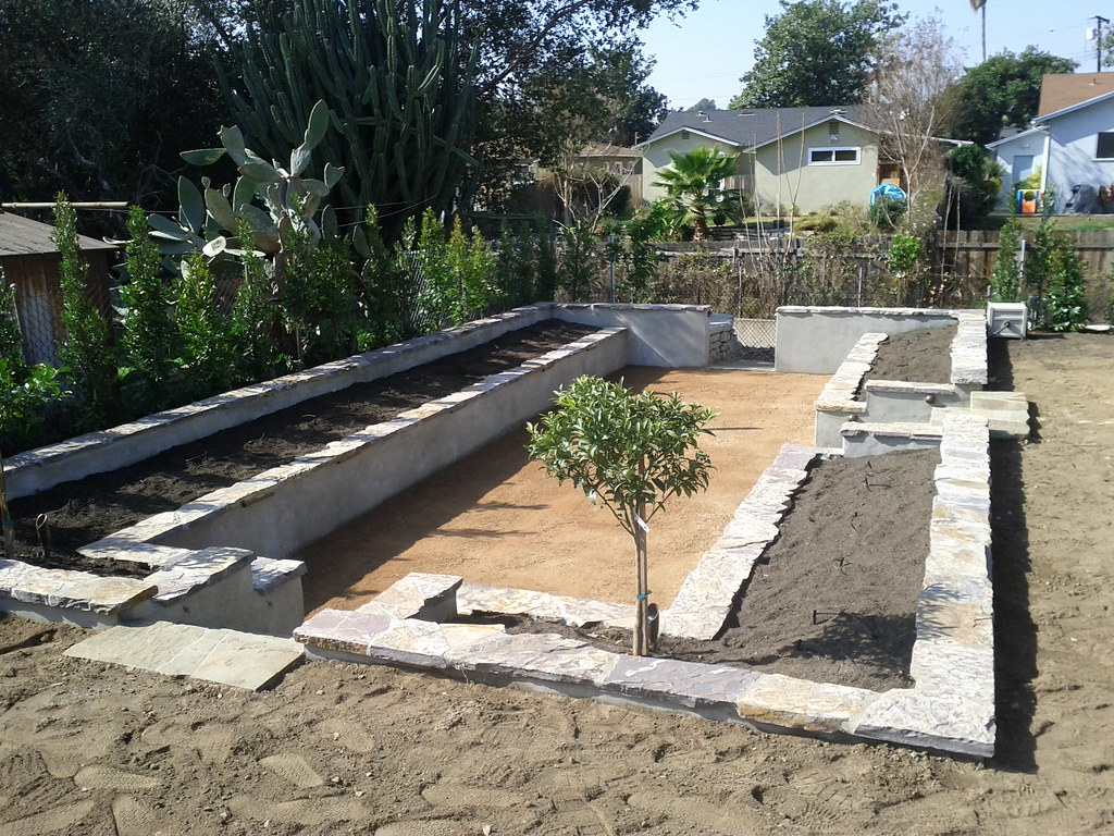 Retaining wall and raised garden bed under construction
